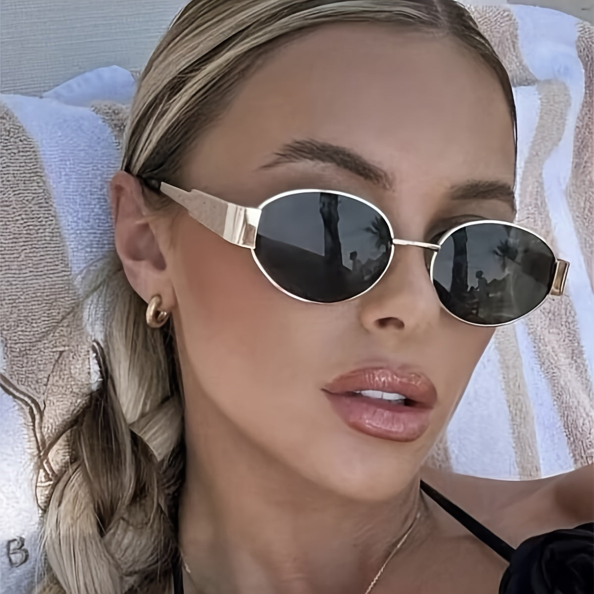 Majella | Minimalistische Ovale Zonnebril met Gouden Frame