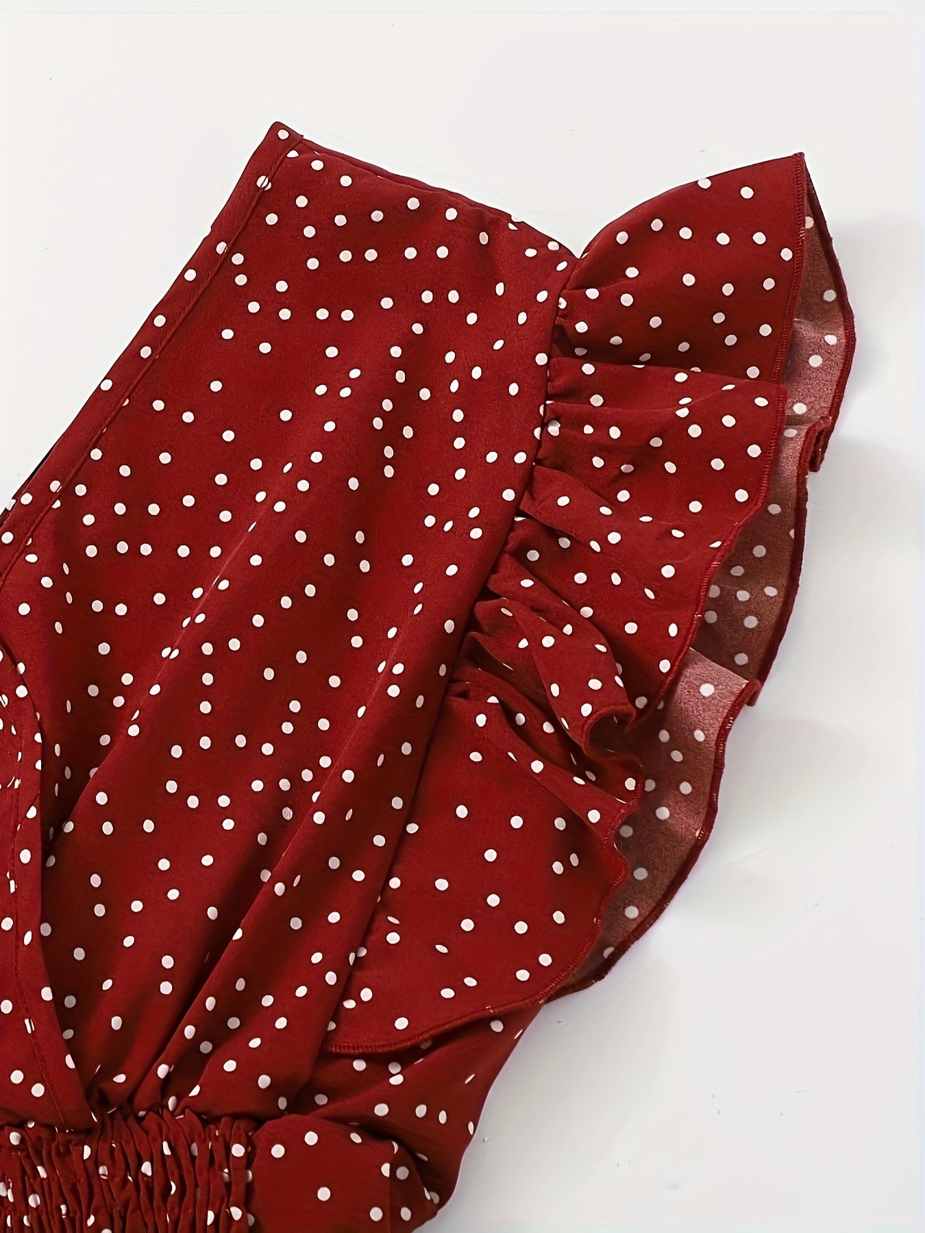 Berita | Ruffle Crop Top met Polkadotprint en Strikdetails