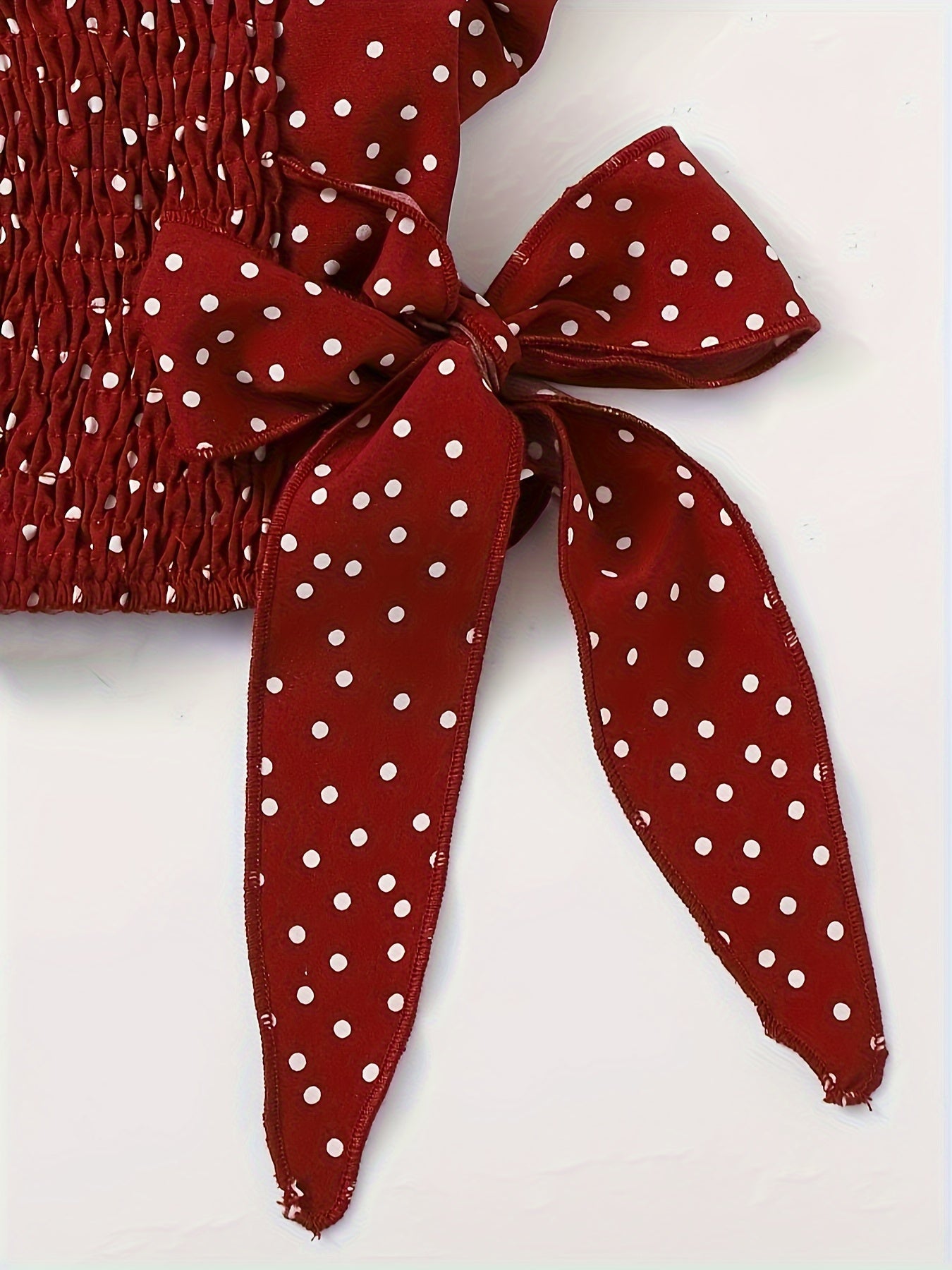 Berita | Ruffle Crop Top met Polkadotprint en Strikdetails