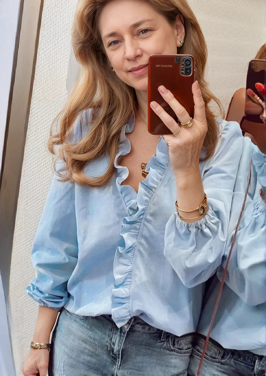 Verfijnde luchtige dames blouse met ruches en bloemenprint