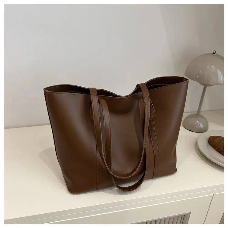 Elegante Dames Schoudertas met Stevige Hengsels en Ruim Model