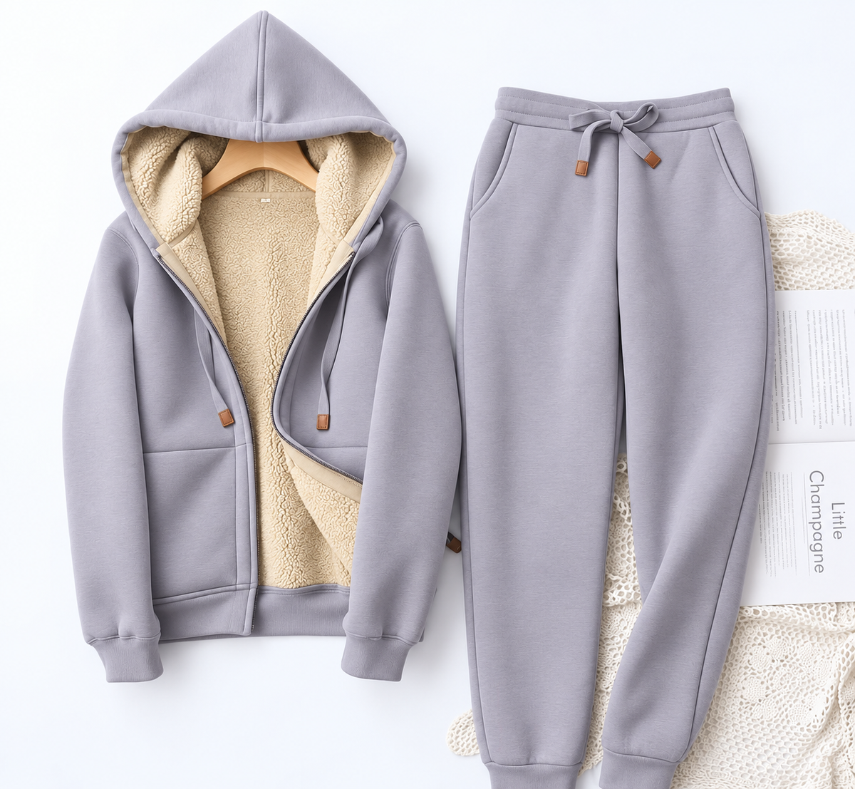 Przytulny damski dres z podszewką teddy, kieszenią kangurką i ściągaczami