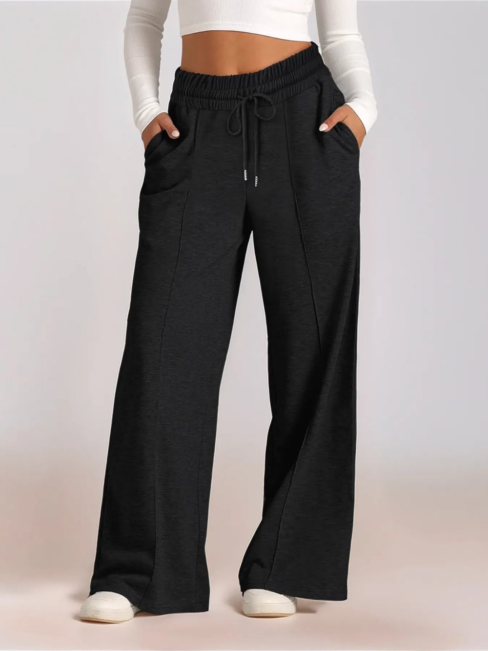 Pantalon jogging gris pour femmes avec taille élastique et jambes larges