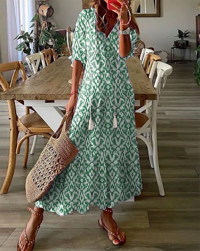 Flowy maxi dress for women with lantern sleeves and tassel tie