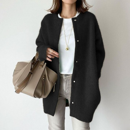 Lichte oversized dames jas met knoopsluiting en lange pasvorm