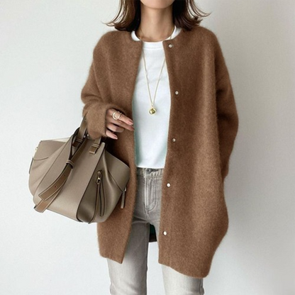 Lichte oversized dames jas met knoopsluiting en lange pasvorm