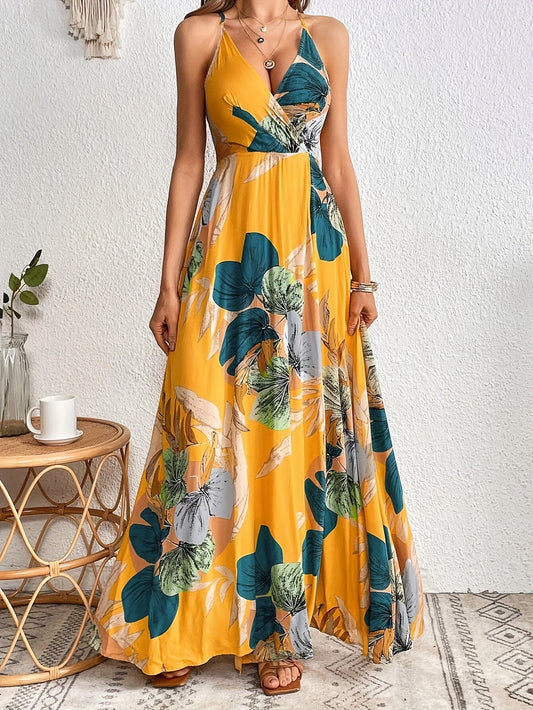Devi | Zomerse Maxi Jurk met Tropische Print en Spaghettibandjes