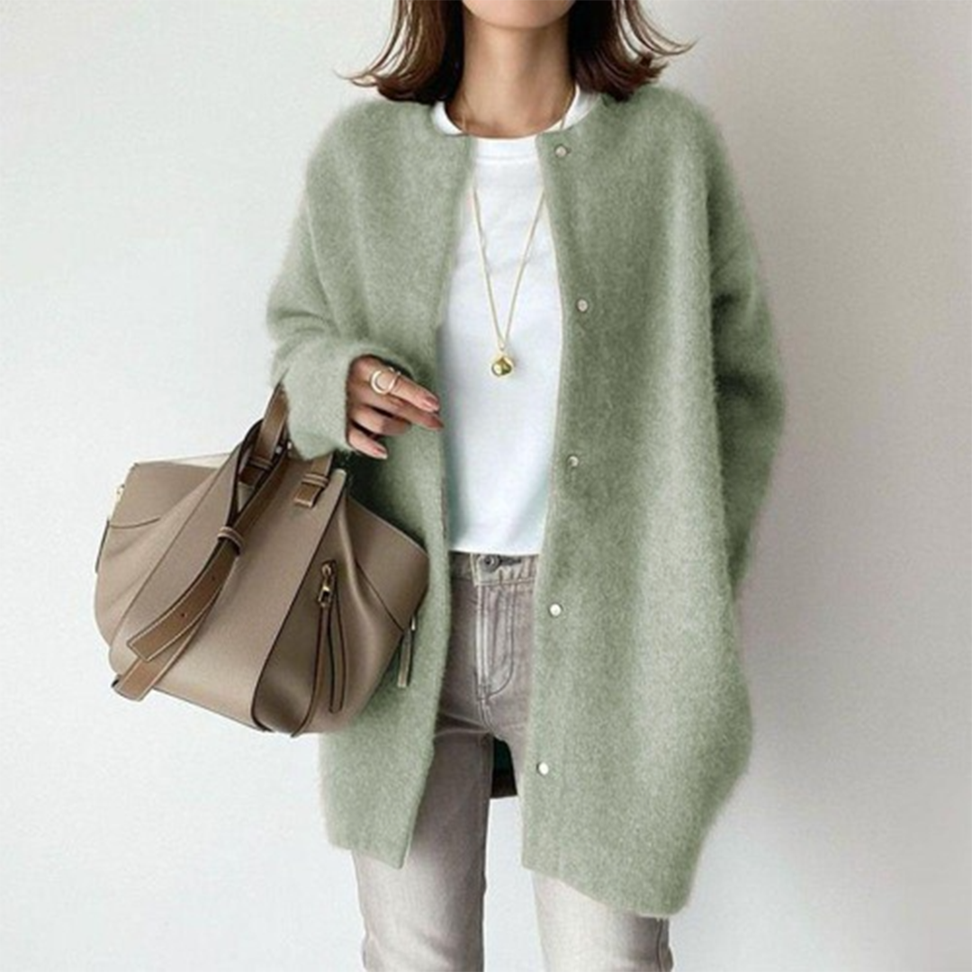 Lichte oversized dames jas met knoopsluiting en lange pasvorm