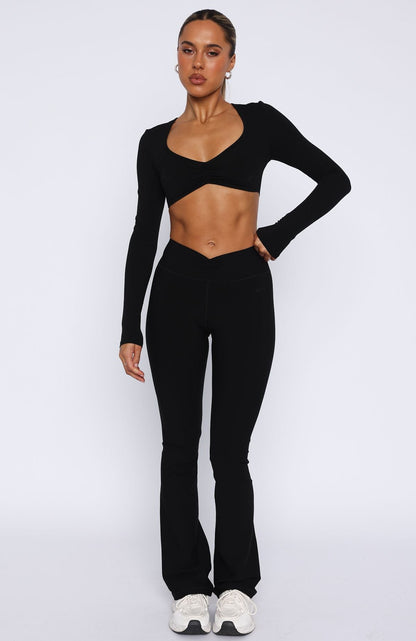 Stijlvolle Zwarte Dames Flared Legging met Hoge Taille
