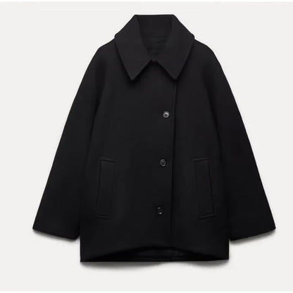 Lichte oversized dames wollen jas met knoopsluiting