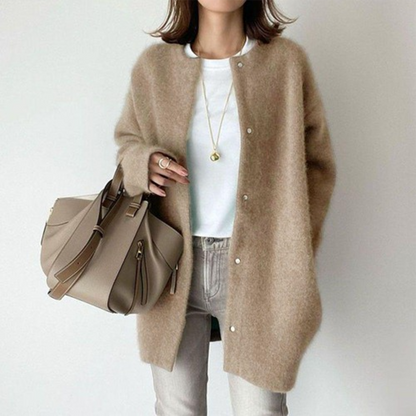 Lichte oversized dames jas met knoopsluiting en lange pasvorm