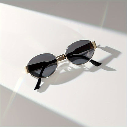 Majella | Minimalistische Ovale Zonnebril met Gouden Frame