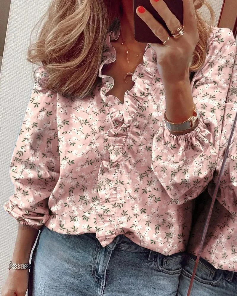 Verfijnde luchtige dames blouse met ruches en bloemenprint