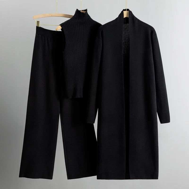Comfortabele chique dames set met lange jas en rechte broek