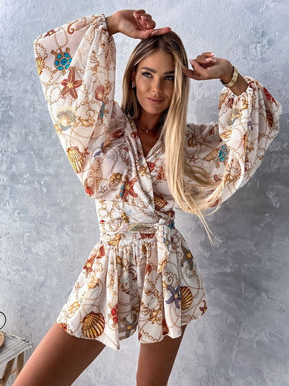 Floortje | Zwierige Playsuit met Tropische Print en Kimono Mouwen