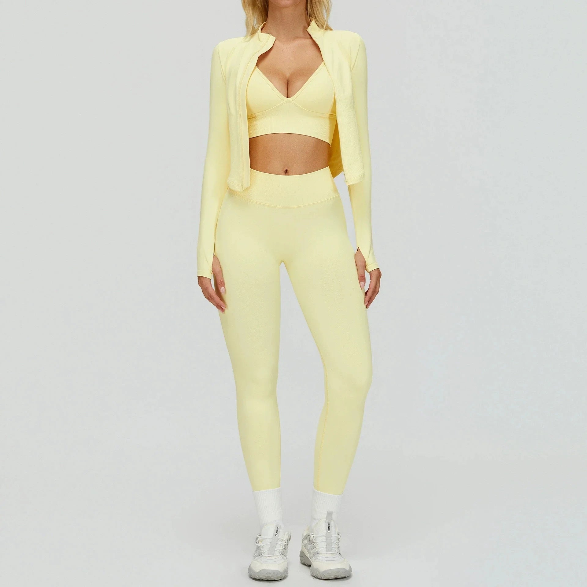 gele sportoutfit dames met aansluitende legging en bh