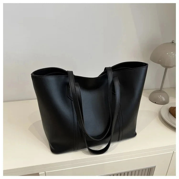 Elegante Dames Schoudertas met Stevige Hengsels en Ruim Model