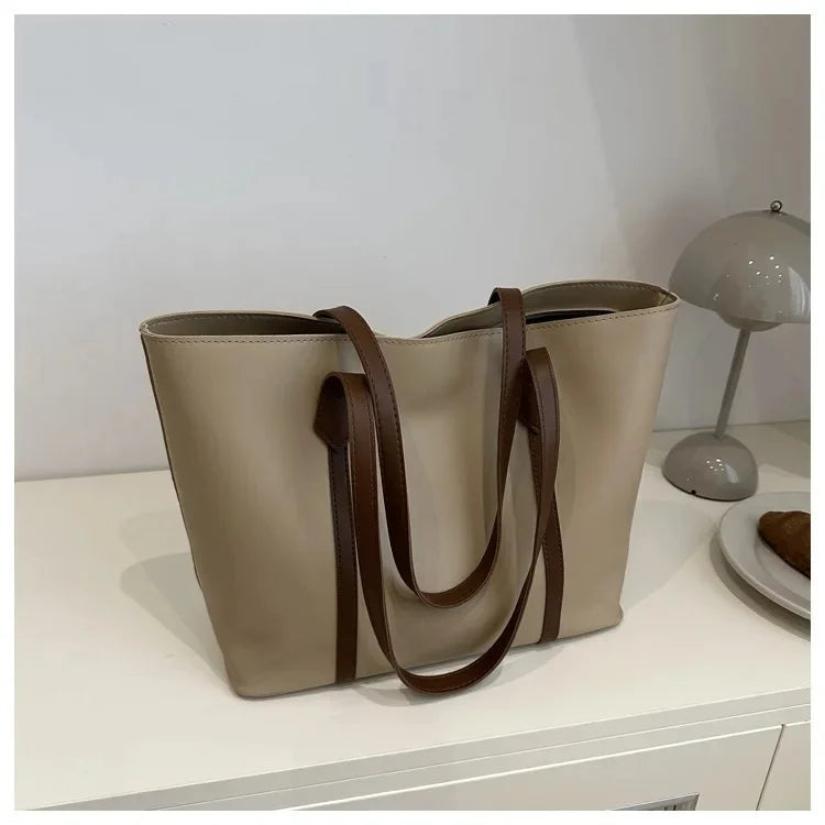 Elegante Dames Schoudertas met Stevige Hengsels en Ruim Model