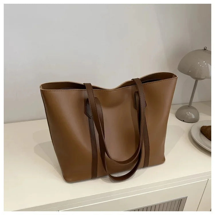 Elegante Dames Schoudertas met Stevige Hengsels en Ruim Model