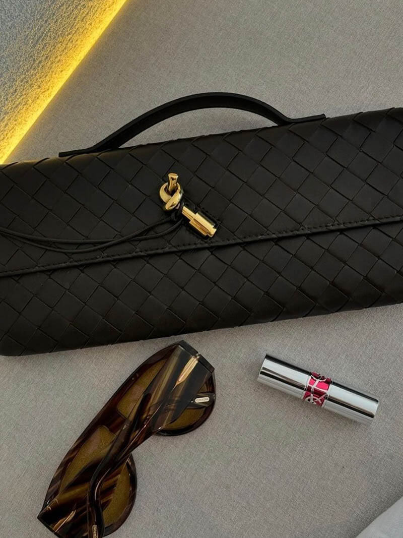 Chique Dames Handtas met Woven Design en Gouden Sluiting
