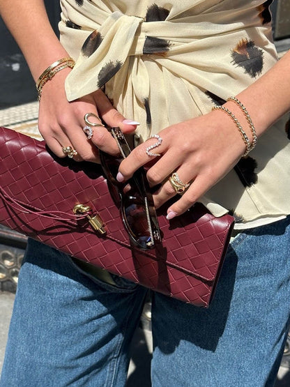 Chique Dames Handtas met Woven Design en Gouden Sluiting